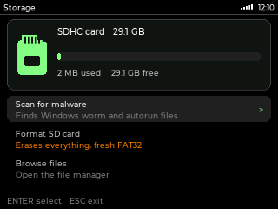 The MeshOS Storage screen showing a 29.1 GB SDHC card with 2 MB used, and options to scan for malware, format the card, or browse files